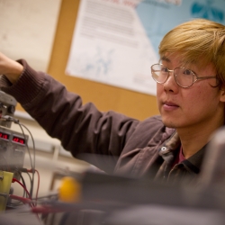 Student using scientific equipment